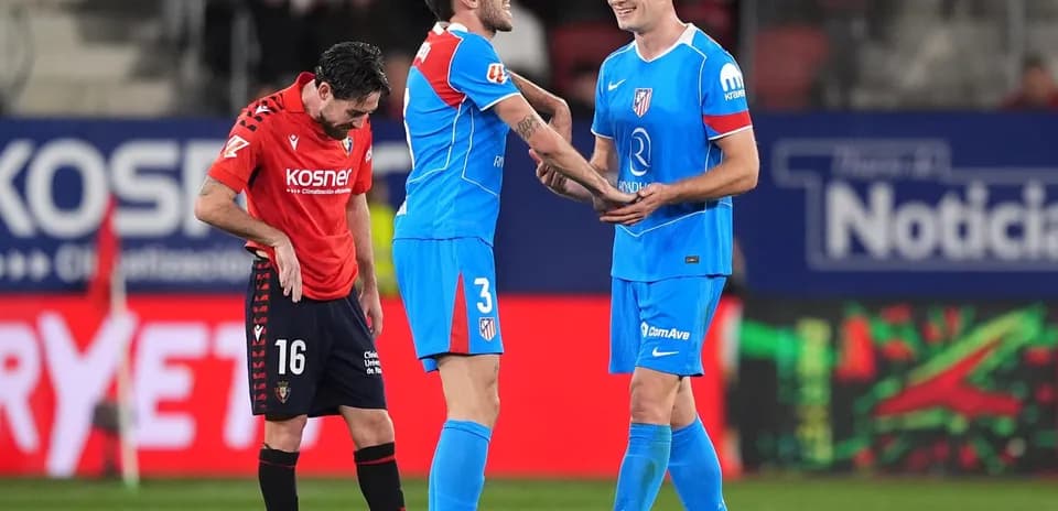 Atletico Madrid players celebrating on the field