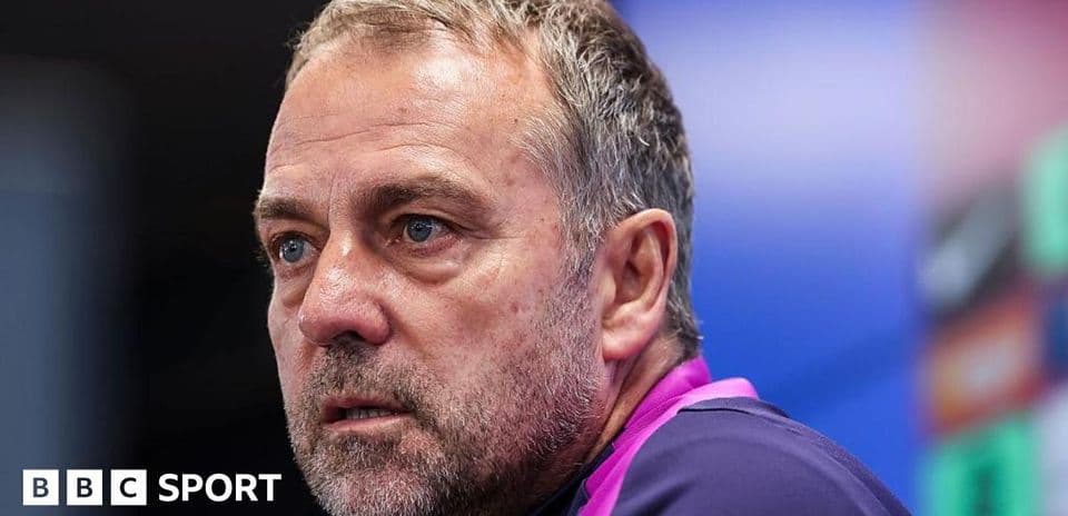 Coach speaking during a press conference