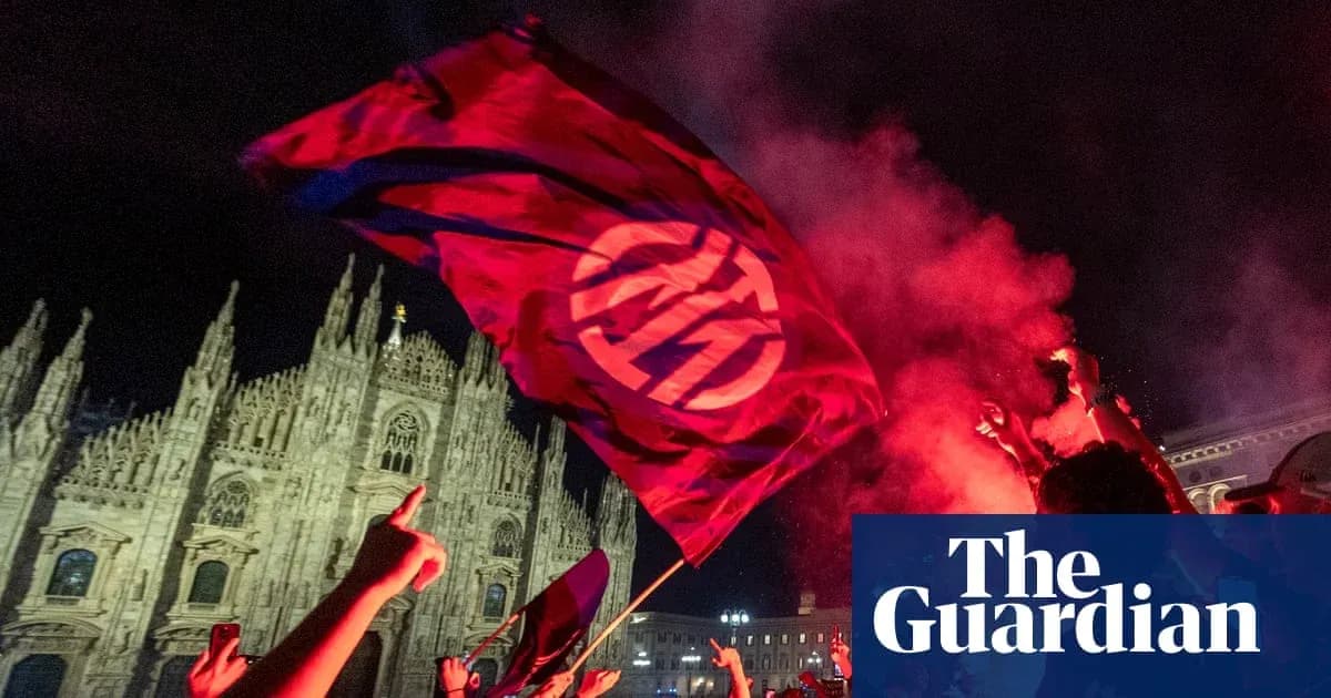 Fans celebrating with flag in front of cathedral