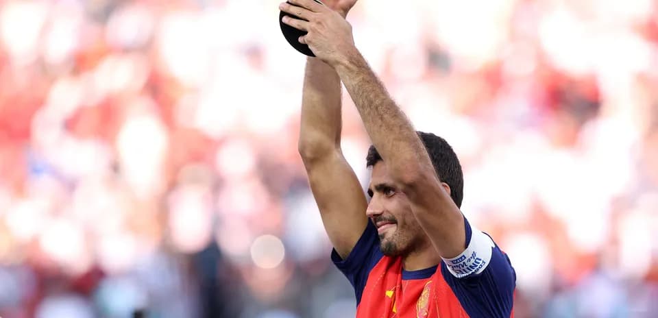 Player celebrating with trophy after winning match