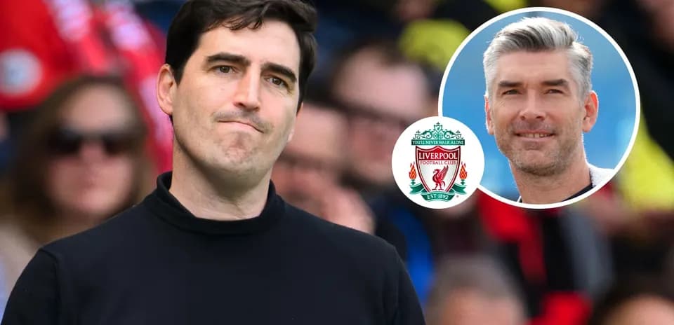 Coach looking concerned during a match with Liverpool logo