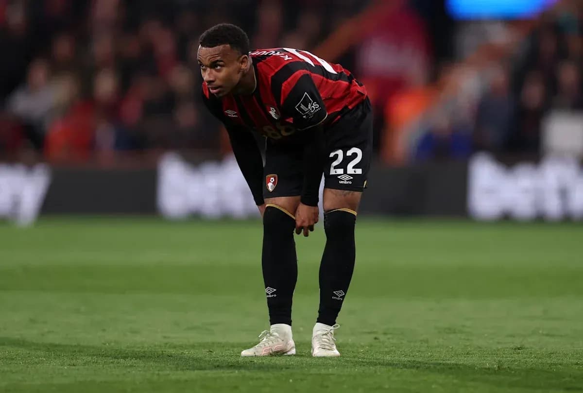 Bournemouth player bent over on the field