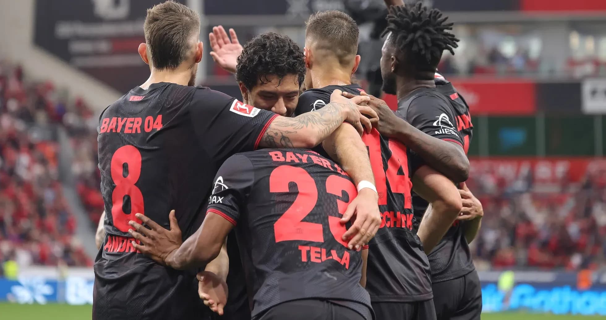 Bayer Leverkusen players celebrating a goal