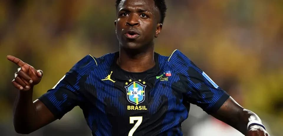 Player celebrating a goal in Brazil national team jersey