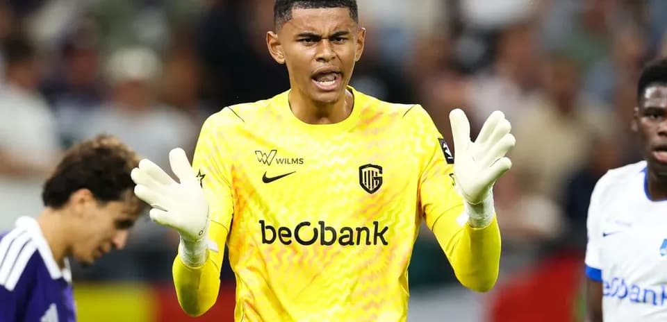 Goalkeeper gesturing during a match in yellow uniform