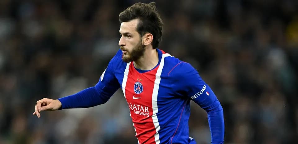 Player running with ball during PSG match