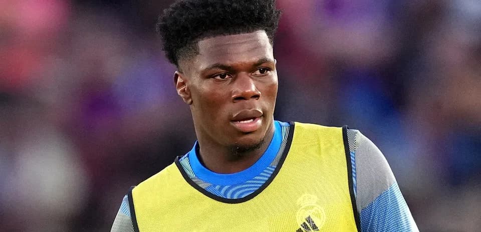 Player wearing training gear on the sidelines