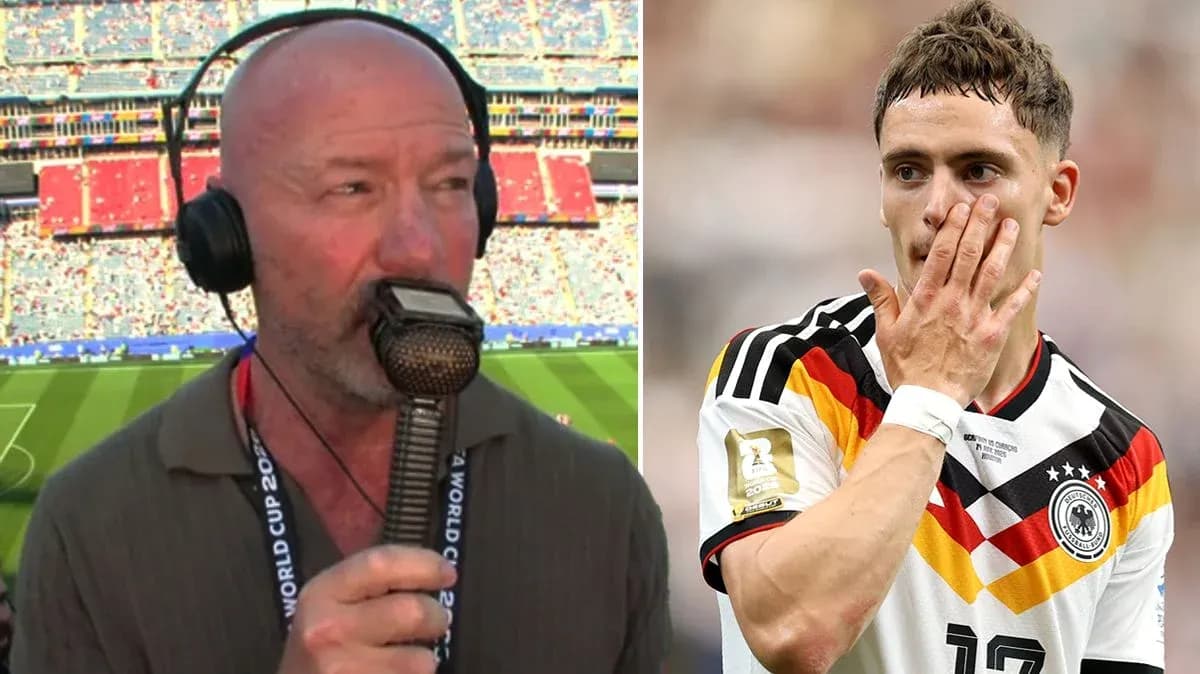 Commentator speaking with microphone during match