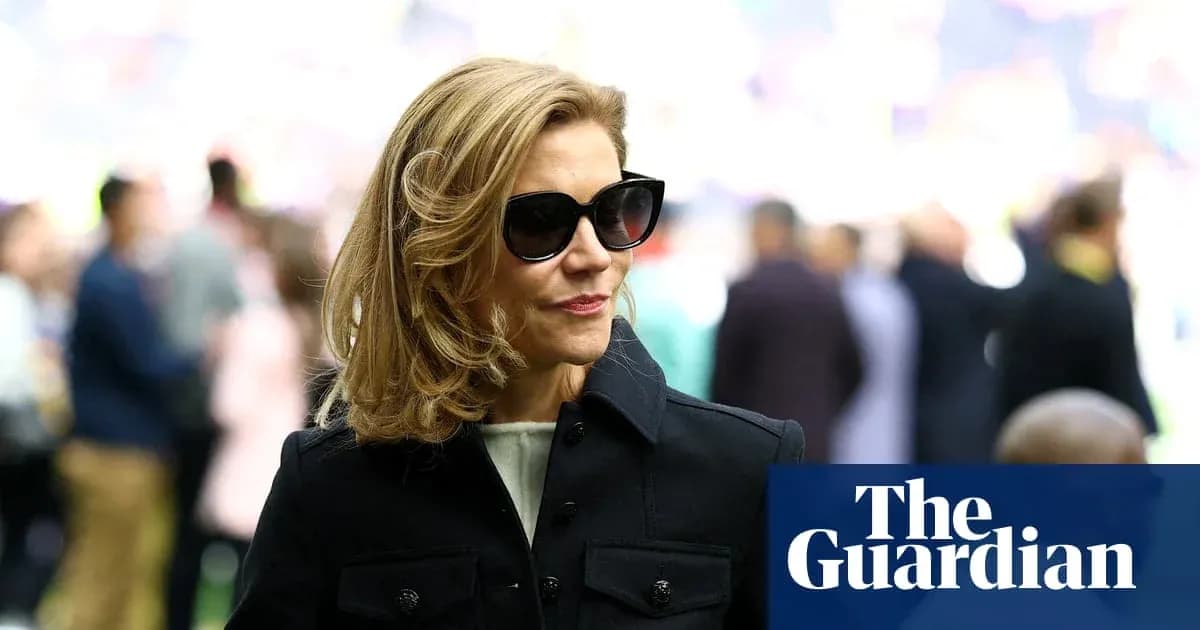 Woman wearing sunglasses at a sports event