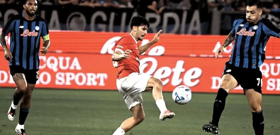 Player kicking the ball during a soccer match