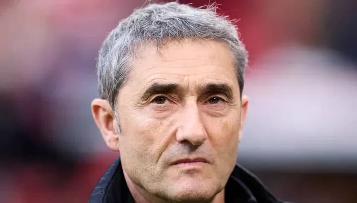 Coach with serious expression during match