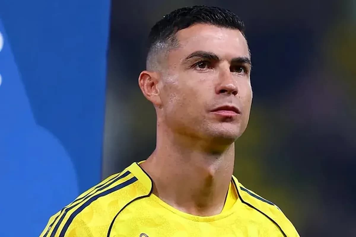 Player in yellow jersey standing before a match