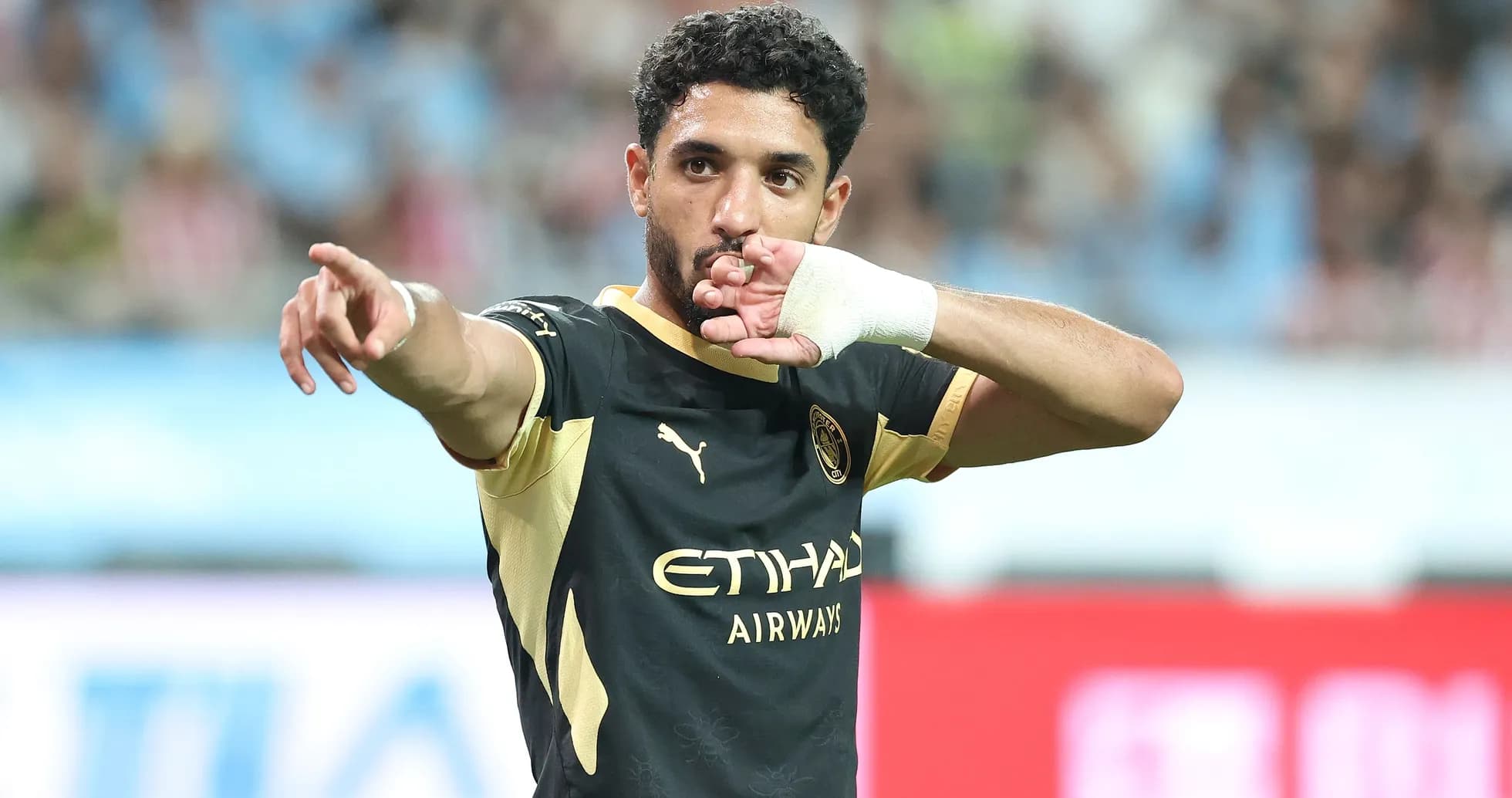 Player celebrating with hand gesture during match