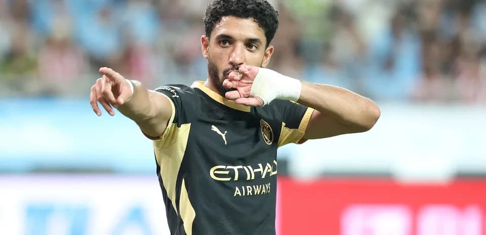 Player celebrating with hand gesture during match