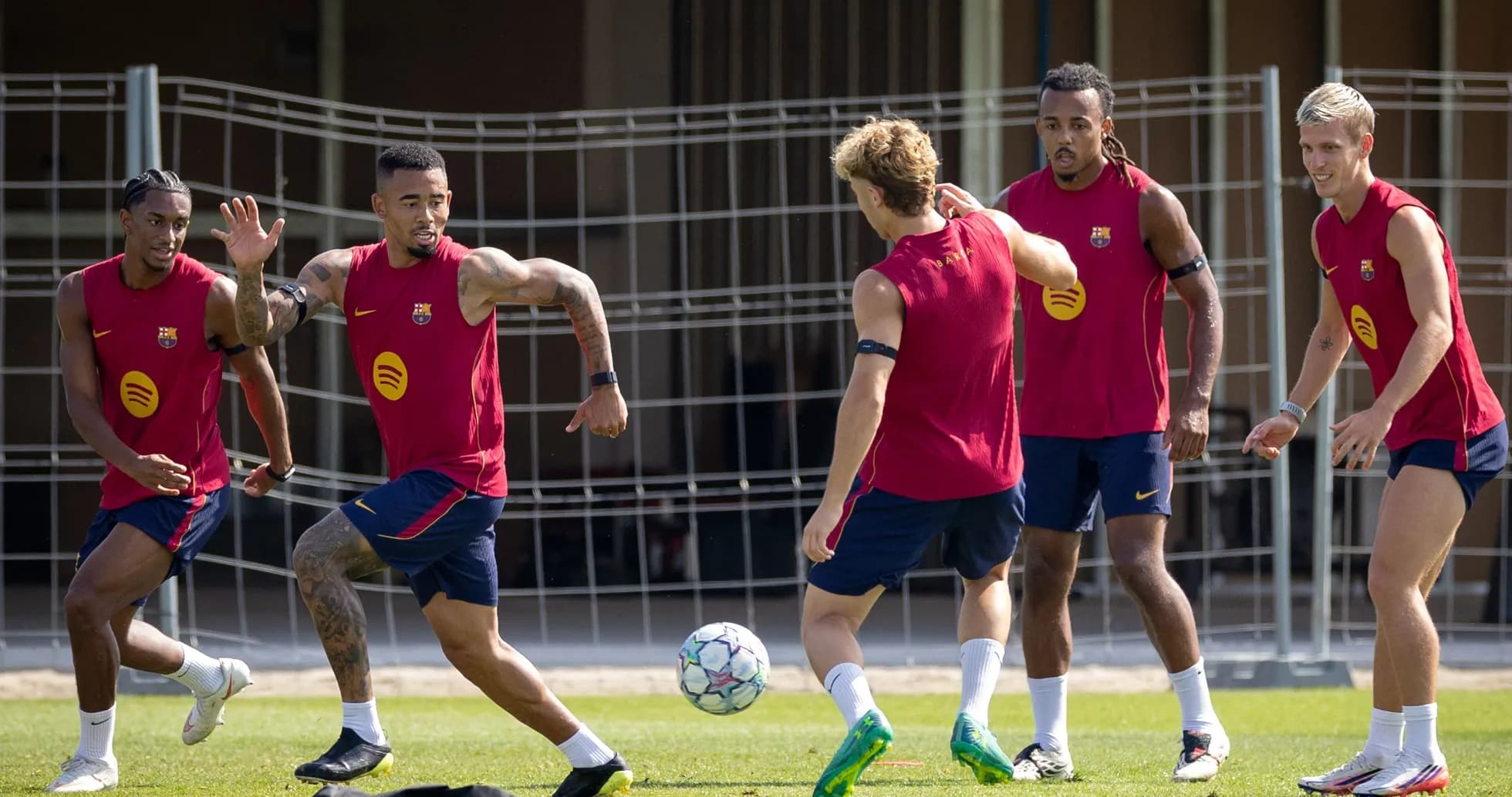 Barcelona players training and passing the ball