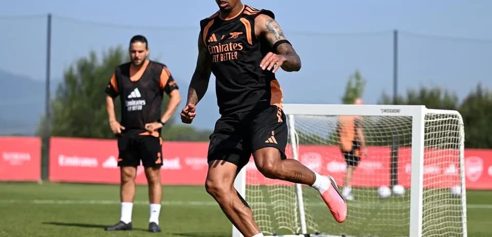 Player dribbling a soccer ball during training session