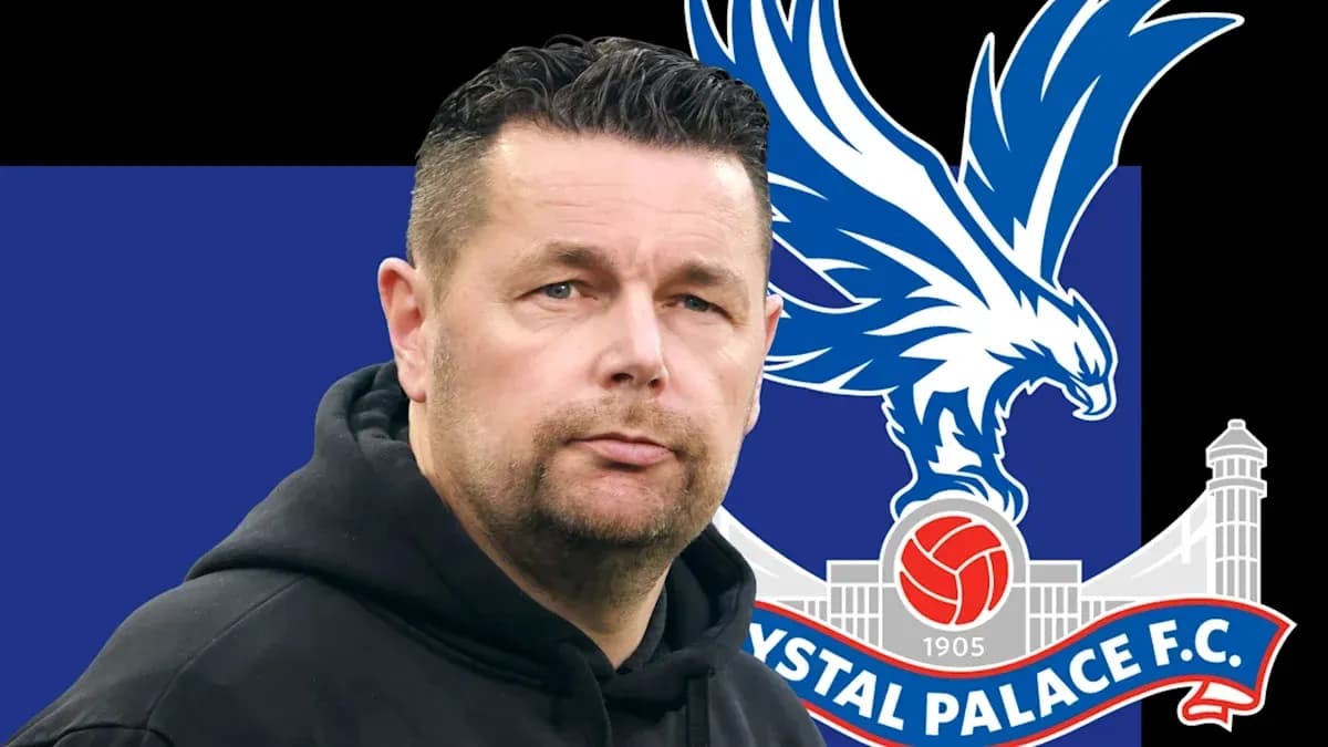 Coach in front of Crystal Palace FC logo
