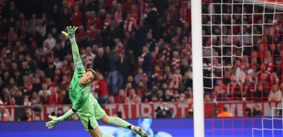 Goalkeeper diving to save a penalty shot