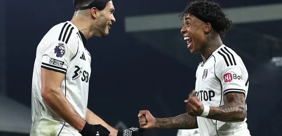 Fulham players celebrating a goal during match