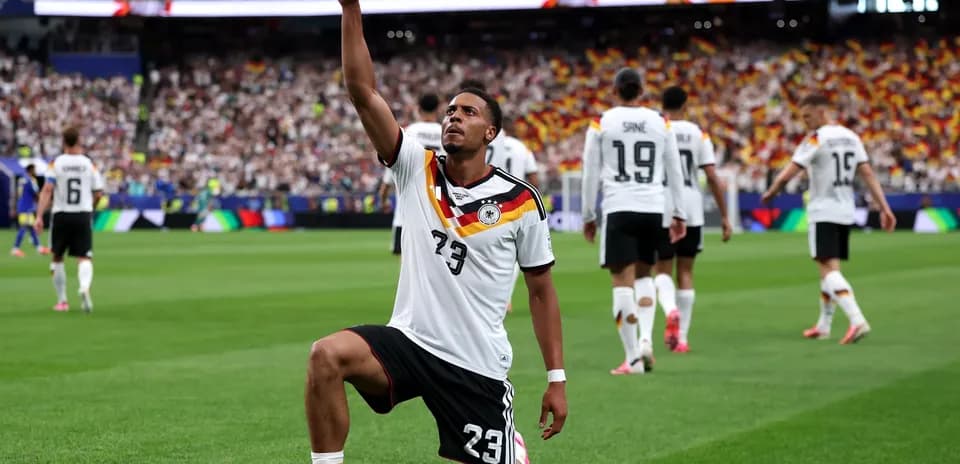 Player celebrating during Germany football match