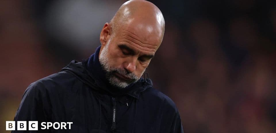 Manager looking down on the sidelines during match