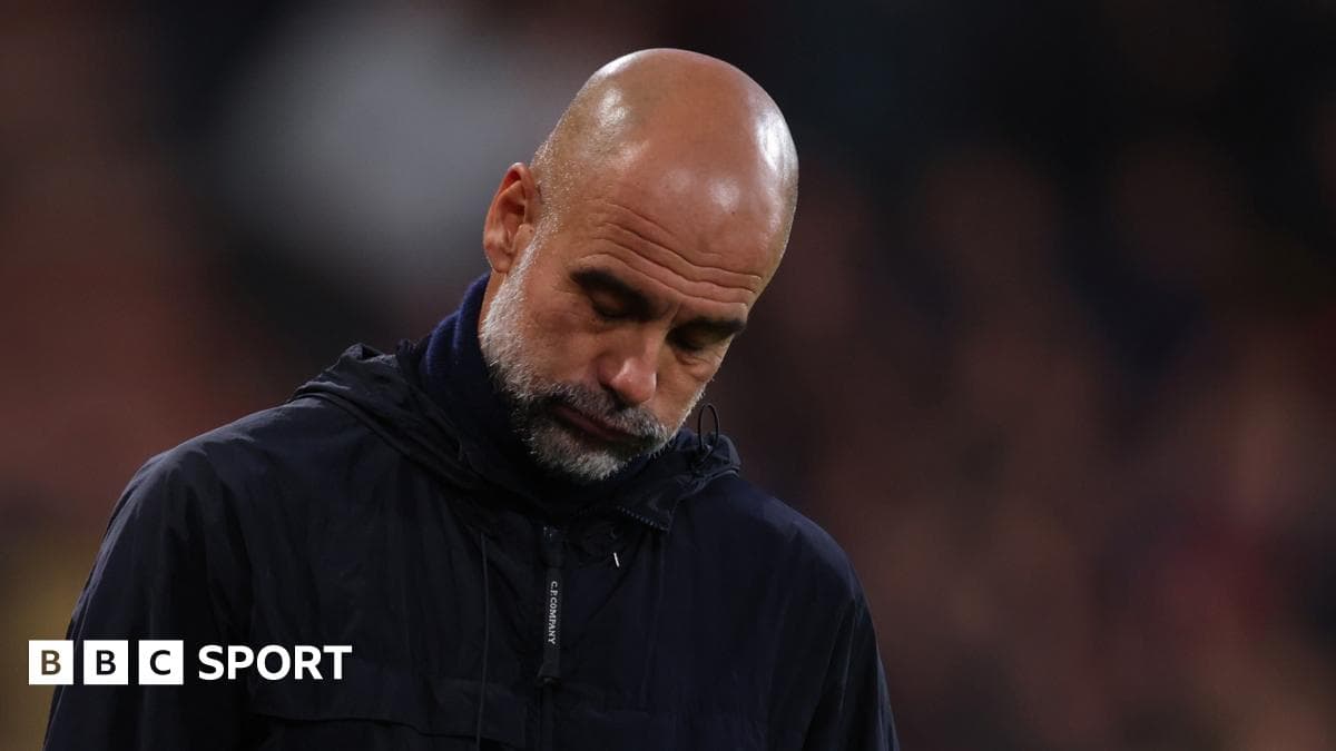 Manager looking down on the sidelines during match