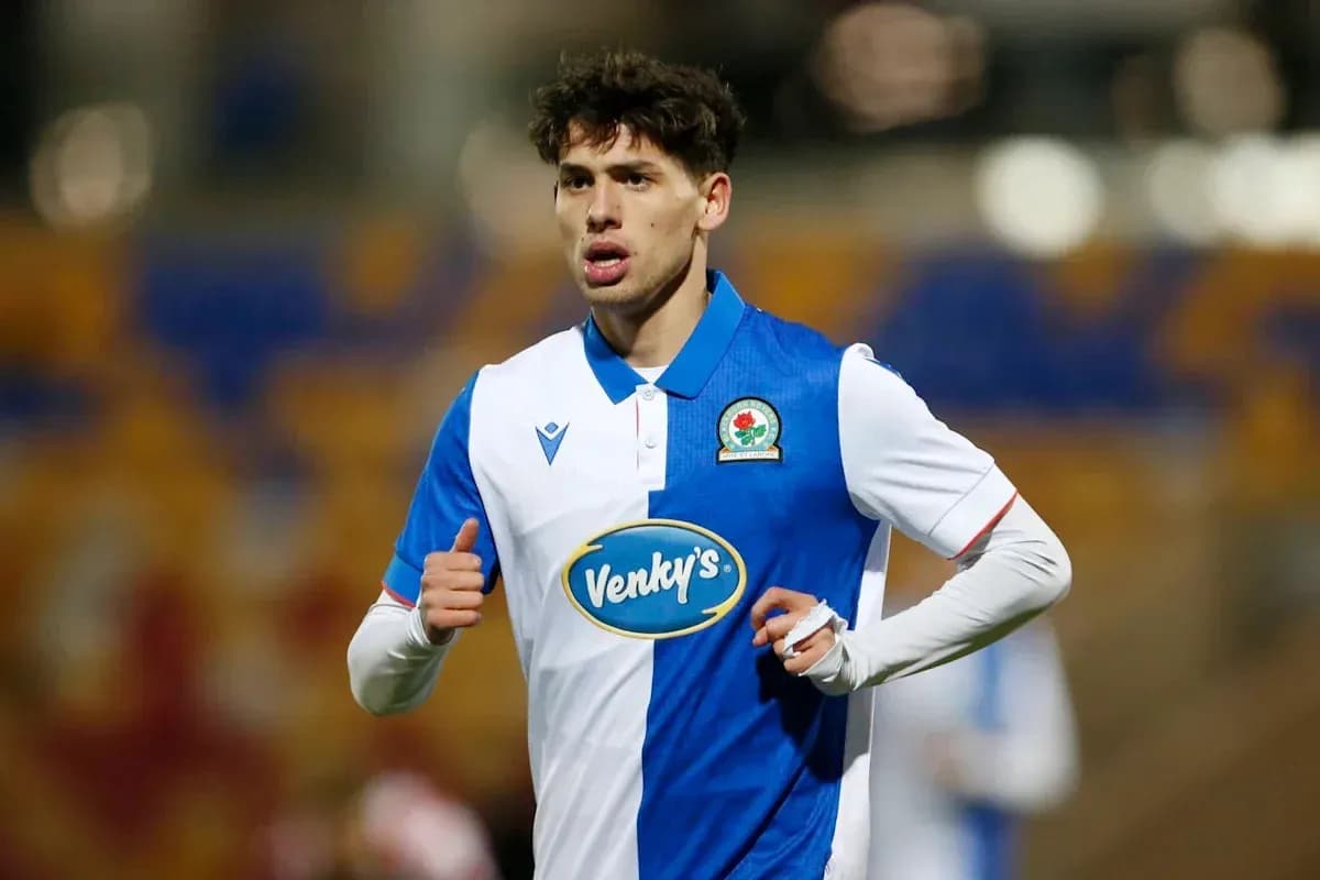 Player wearing Blackburn Rovers kit during match