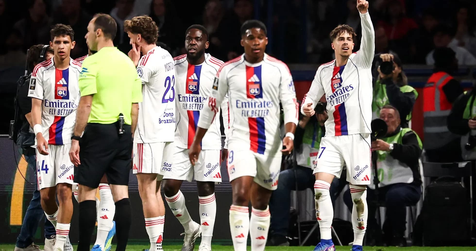 Lyon players celebrating after scoring a goal