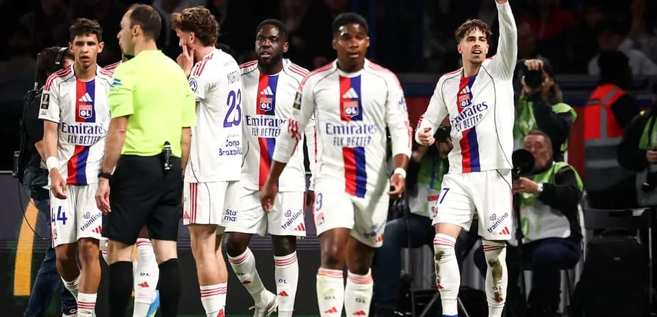 Lyon players celebrating after scoring a goal
