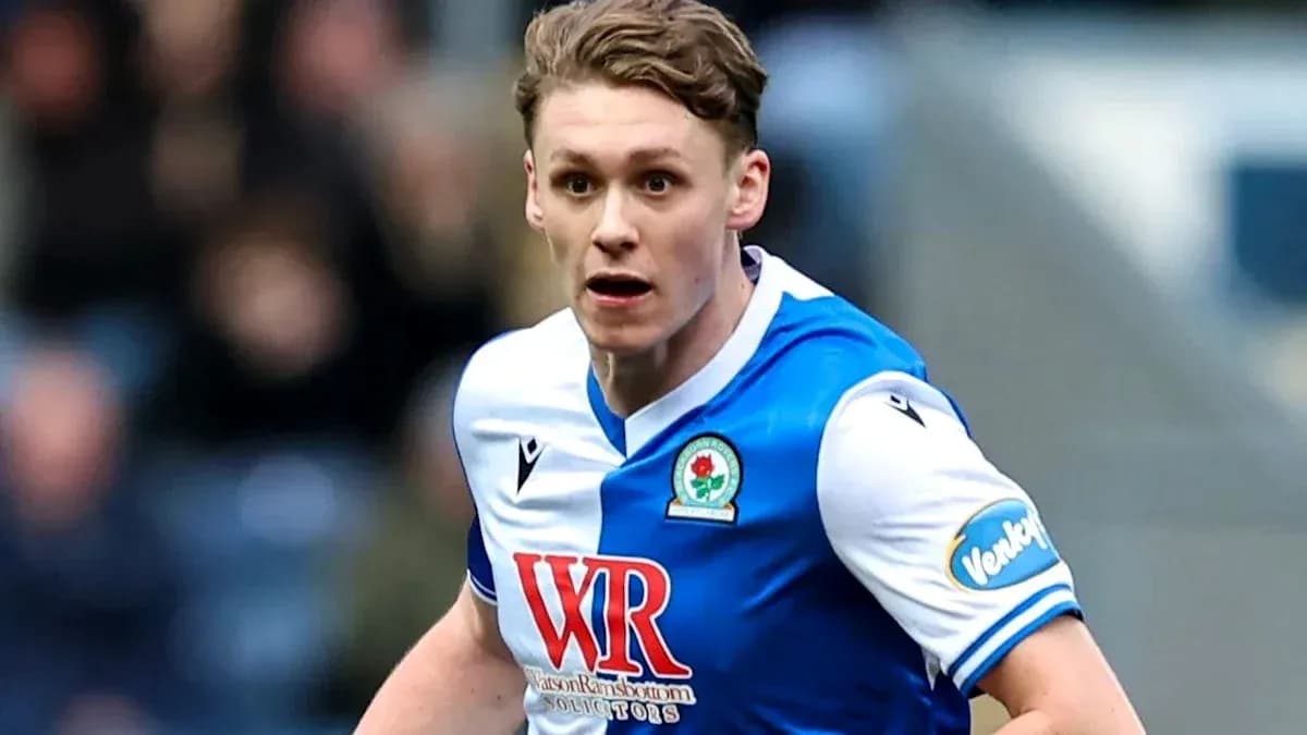 Player running during a football match for Blackburn Rovers