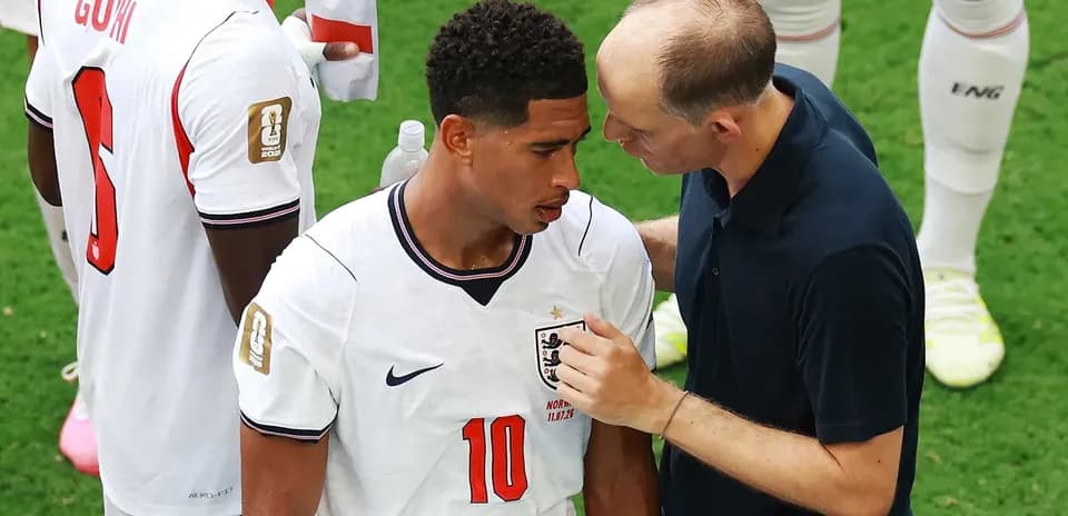 Player receiving instructions from coach during match
