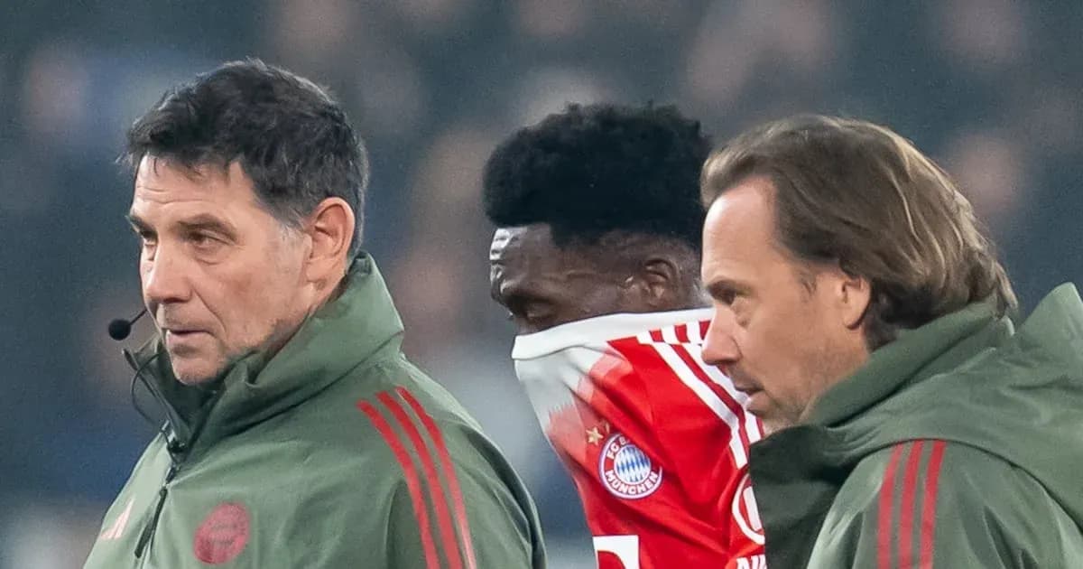 Coaches and player during a match substitution