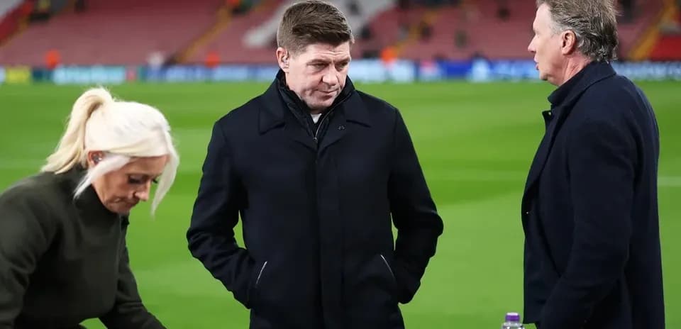 Three sports analysts discussing on the pitch