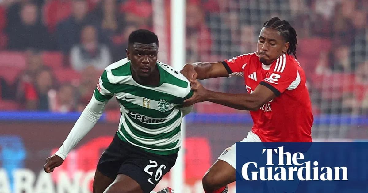 Two players competing for the ball during match