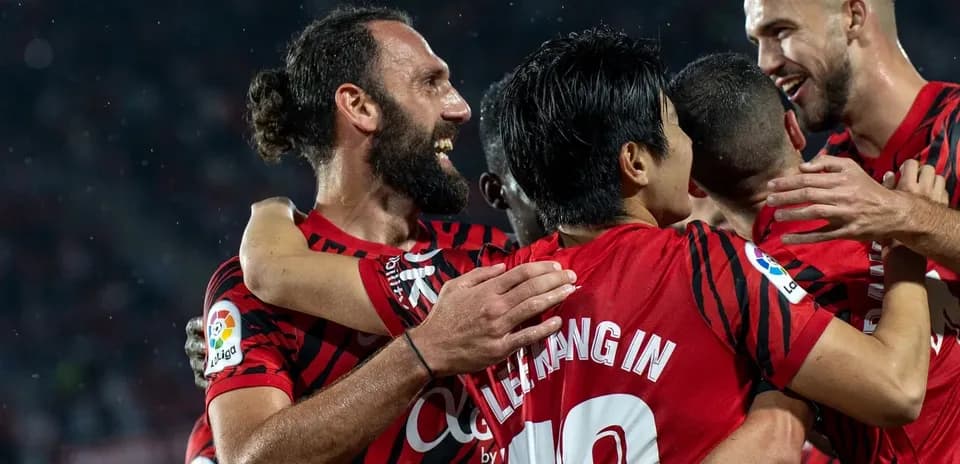 Mallorca players celebrating a goal during match