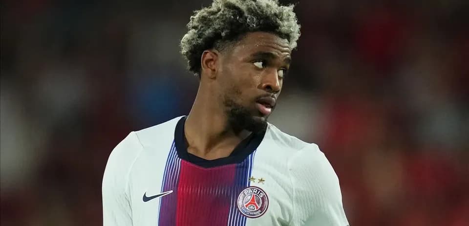 Player in PSG jersey during match action