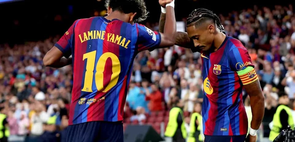 Lamine Yamal celebrating a goal with teammate