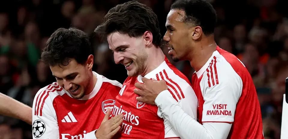 Arsenal players celebrating a goal together