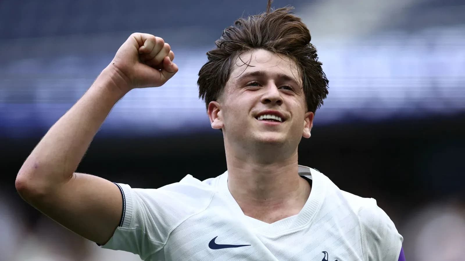 Player celebrating a goal with raised fist