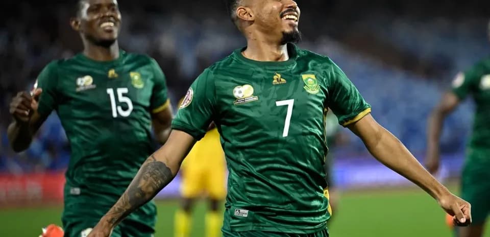 Player celebrating after scoring a goal during match