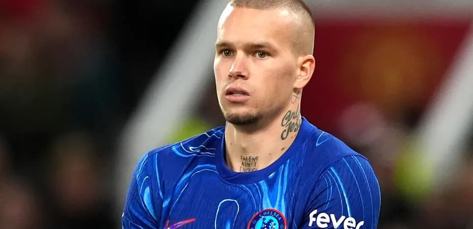 Player in blue Chelsea kit during match