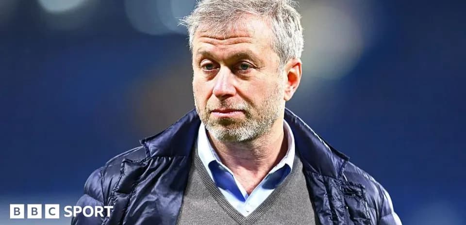 Man in a jacket during sports event