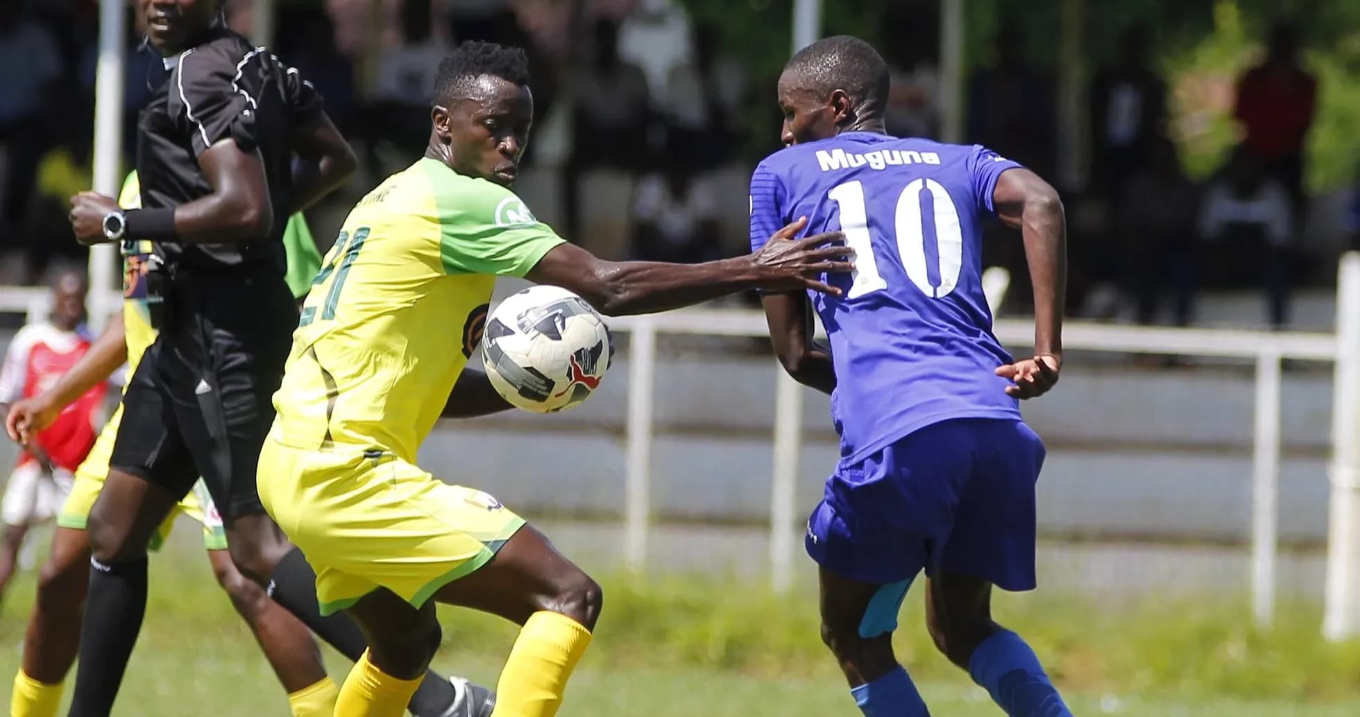Players competing for the ball in FKF Premier League