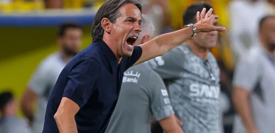 Coach shouting instructions from the sidelines during match