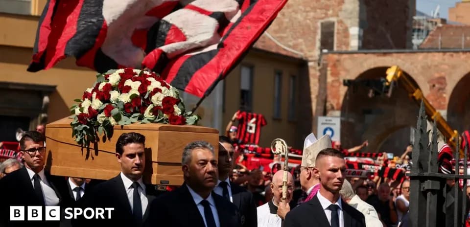 Funeral procession with casket and supporters in background