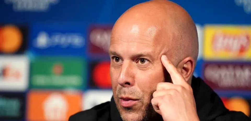 Coach speaking at UEFA Champions League press conference