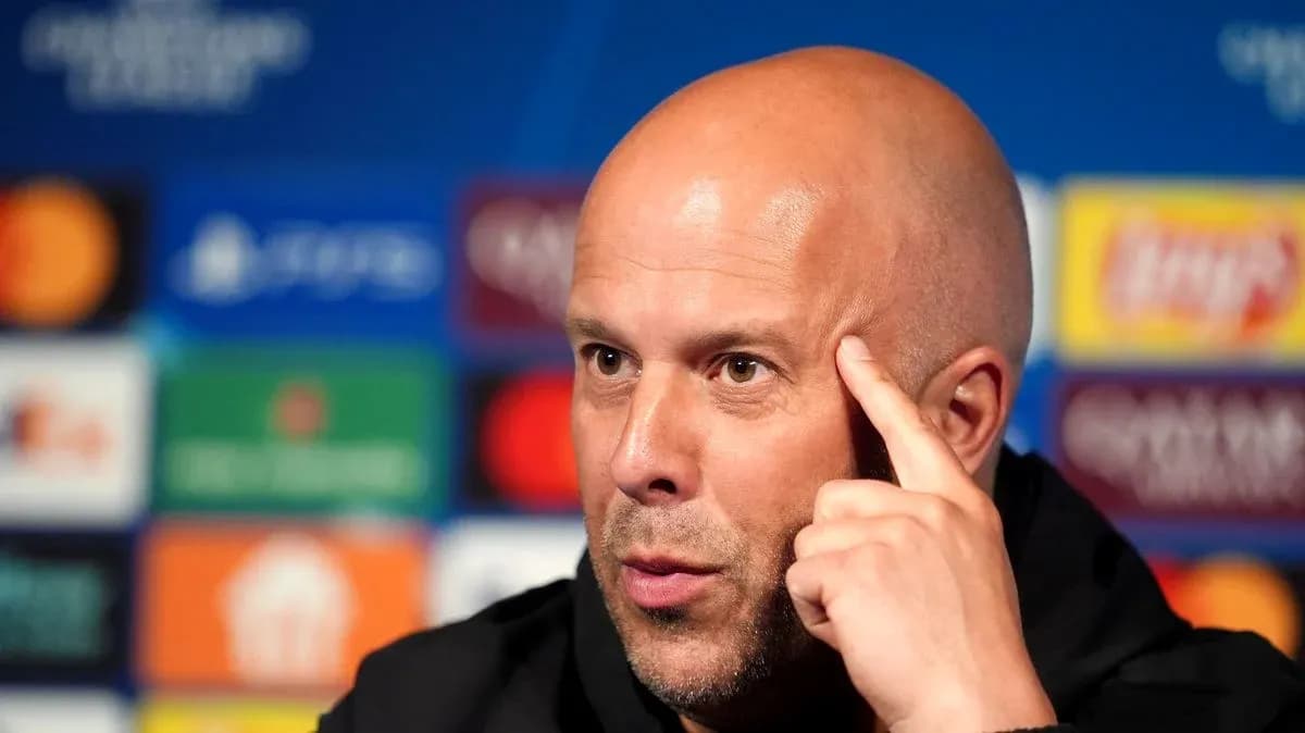 Coach speaking at UEFA Champions League press conference