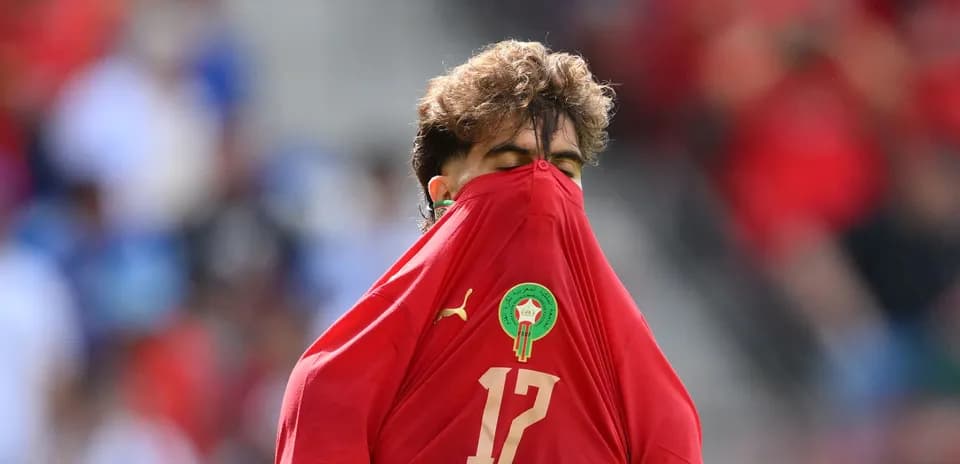 Player hiding face with jersey during match