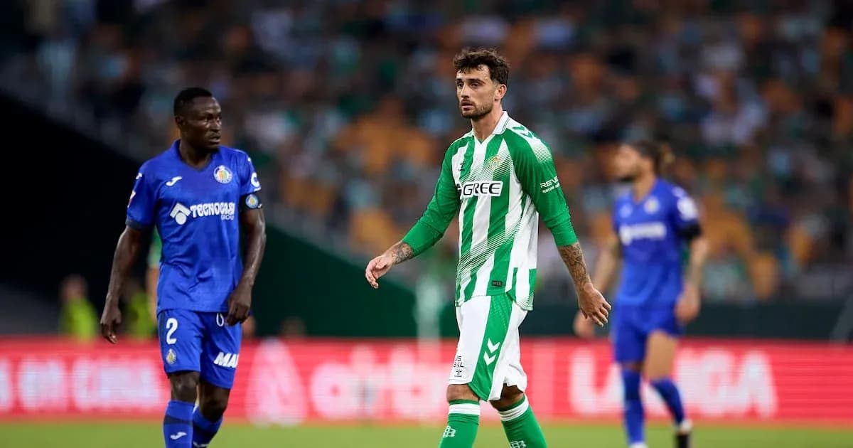 Two players on the pitch during match action