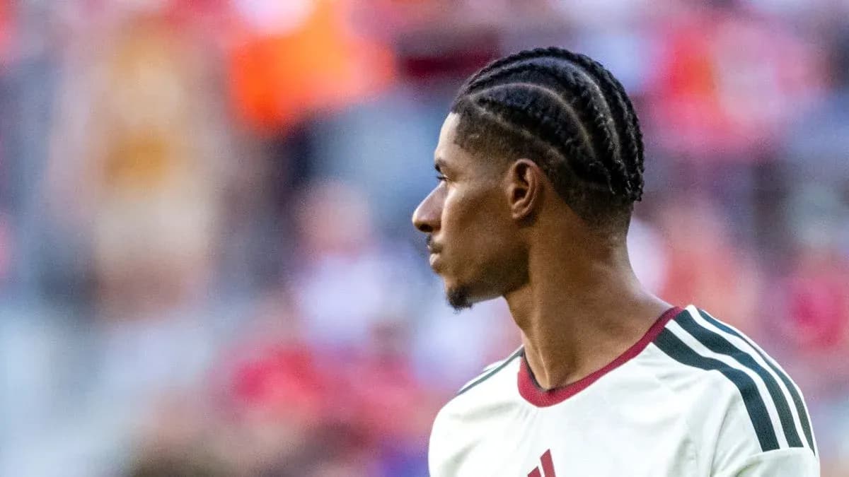 Player with braided hair during warm-up session